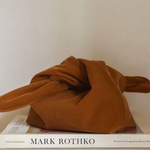 Merit’s signature corduroy bag. Never used